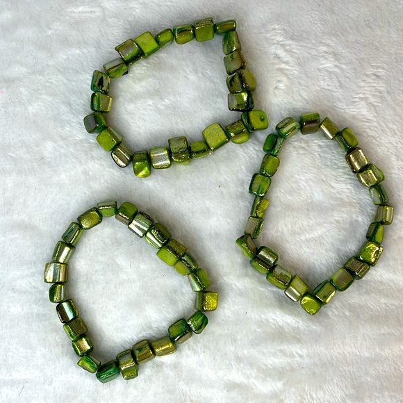 Three green spiny shell elastic bracelets. - Picture 1 of 3